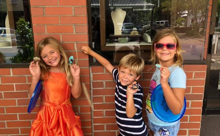 Local kids find hidden shells downtown Fernandina Beach. Submitted photo 