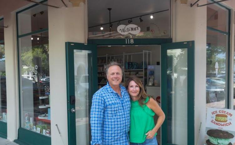 Brian Kyzer and Kam Kyzer pose outside of the WataNut retail store on Centre Street in Fernandina Beach. Submitted photo