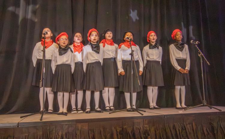 Members of the Nassau County Boys and Girls Club Choir perform for attendees of their 19th annual gala at the Ritz Carlton on Saturday.  By Marisa DeMar/News-Leader 