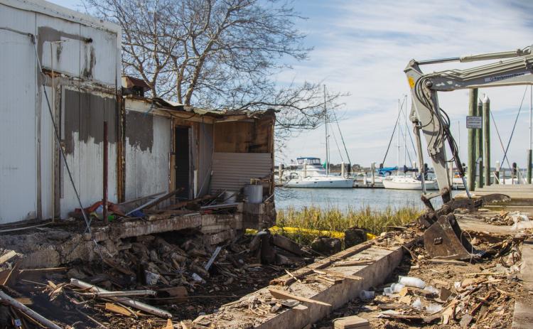 Atlantic Seafood partially demolished Wednesday at the Downtown Fernandina Beach Marina. Photo by Ashley Chandler/News-Leader