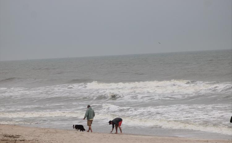 People on Main Beach on Thursday. Photo by Marisa DeMar/News-Leader