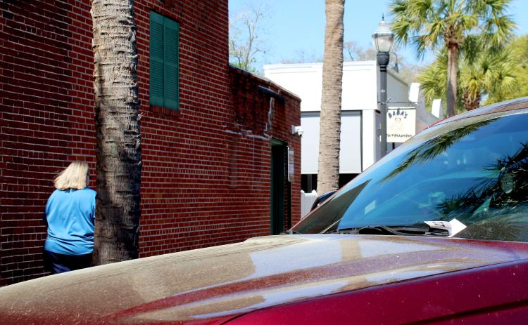 A paid parking ticker on a vehicle parked downtown Friday. Amy Mulligan/News-Leader