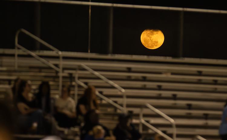 The moon rises over the Yulee High School bleechers on Wednesday at the football field and track. Photo by Ashley Chandler/News-Leader