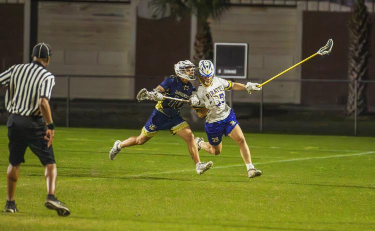 The Pirates lacrosse team beat Sandalwood 13-3 on Friday at FBHS. Photo by Ashley Chandler/News-Leader