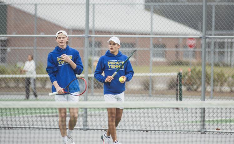 Fernandina Beach’s No. 1 and 2 boys tennis players, Jacob Kovalcik and Peter Colwell prepare for a match in Yulee. Photo by Ashley Chandler/News-Leader