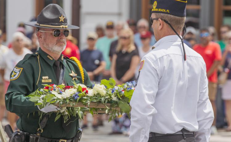 The Nassau County Sheriff’s Office participates in a wreath laying for Memorial Day with members of American Legion Post 54 in Fernandina Beach on Monday. Nick Blank/News-Leader
