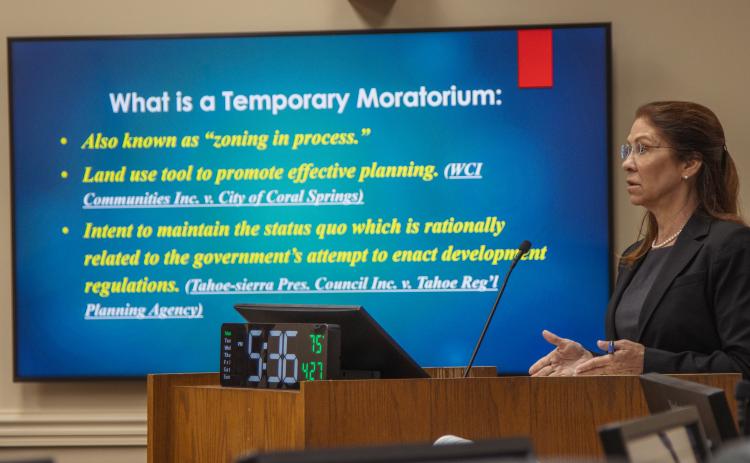 County Attorney Denise May speaks on the proposed data center moratorium at a previous Board of County Commissioners meeting. Photo by Ashley Chandler/News-Leader