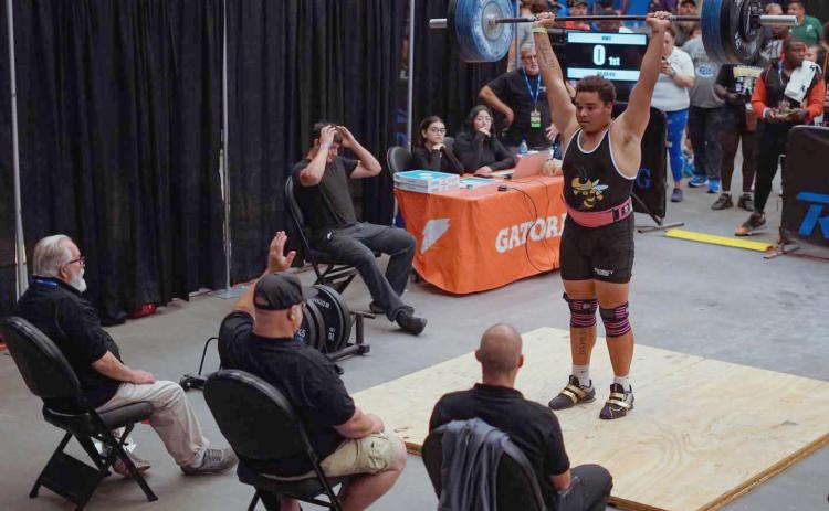 Yulee High School’s Turtle Ricks competes in the FHSAA Weightlifing State Championships last week. Ricks placed first in Olympic Weightlifting and third in Traditional Weightlifting. Photos by Hitsquad Media