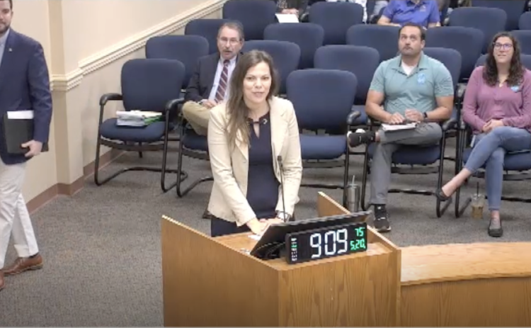 Nassau County Stormwater Director Katie Peay, middle, introduced Sean Lahav, associate vice president and resilience market leader for Halff, left, at the May 20 Board of County Commissioners meeting at the James S. Page Governmental Complex. Image from screenshot