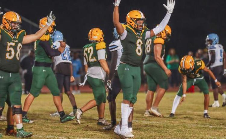 Cody Ogburn, No. 58, and Jaison Brown, No. 8 celebrate in a game during the 2025 season. Both Ogburn and Brown will be seniors this Fall. Photo by Ashley Chandler/News-Leader