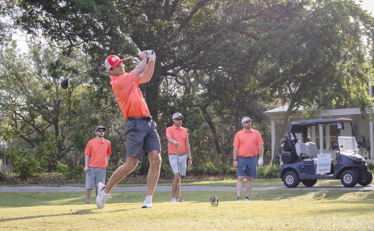 A foursome competes during Par for a Purpose. Submitted