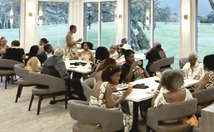 Dozens gathered at the Golf Club of Amelia Island Saturday evening for a Juneteenth evening reception.