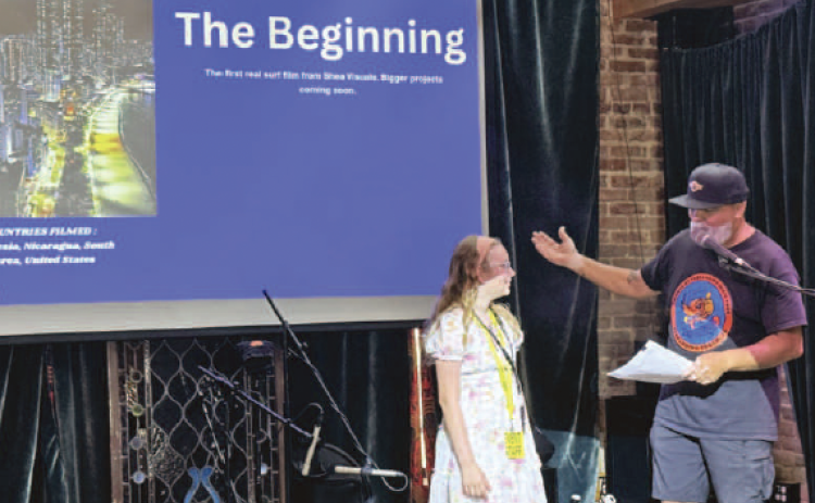 Waldemar Borrero lauds Willow Bowen, 10, for her film “Skate Groms.”