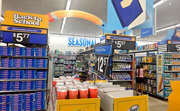 A child looks through school supplies Wednesday at the Walmart on Amelia Island. Photo by Ashley Chandler/News-Leader