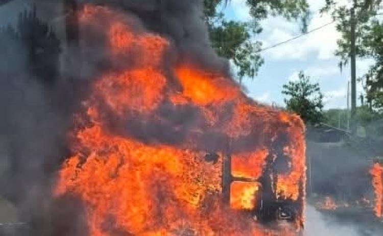 A Jacksonville Transportation Authority van burns on Friday near HIlliard. Submitted