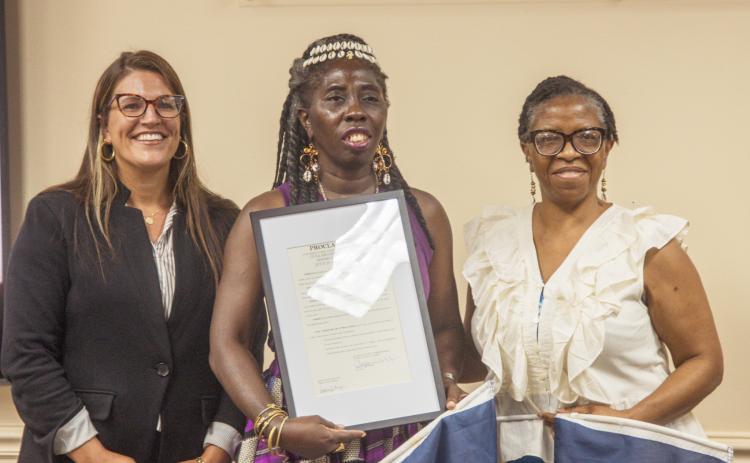 Commissioner Alyson McCullough, left, presented a proclamation designating this week as Gullah/Geechee Appreciation Week in Nassau County to Chieftess of the Gullah/Geechee Nation Queen Quet, middle, and Yulee resident and local representative of the nation Glenda Simmons-Jenkins. Photo by Ashley Chandler/News-Leader