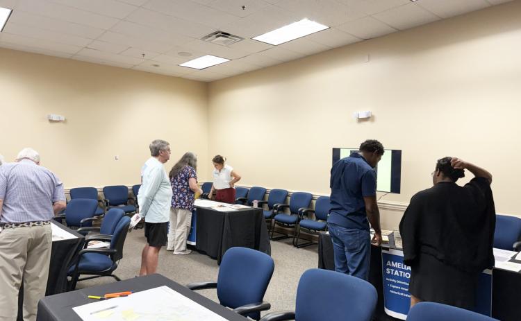 Nassau County staff speak with residents at the July 21 placemaking meeting at the James S. Page Governmental Complex. Nick Blank/News-Leader