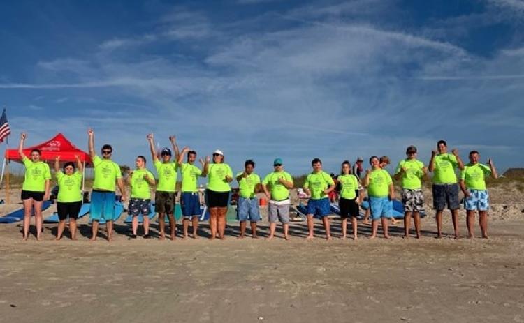 The Nassau County Special Olympics Surf Team enjoy time practicing on the beach. Submitted photo
