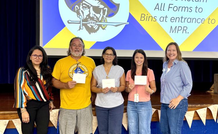 FBHS Foundation members presented school staff with money for school supplies to kick off the school year.