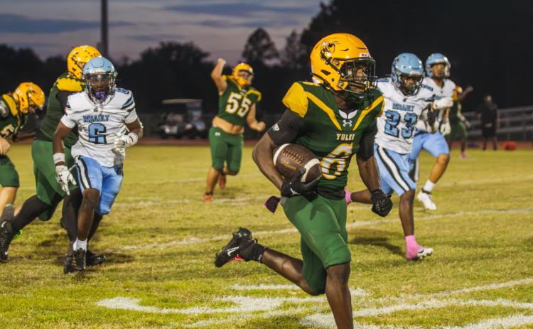 Jayden Timmon carries the ball to the end-zone for the Hornets first touchdown of the game Friday against Ribault. Photo by Ashley Chandler/News-Leader