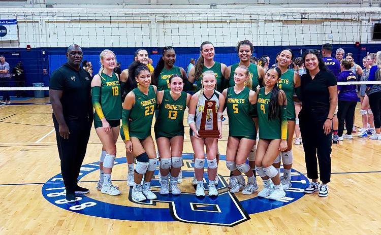 The Yulee High School volleyball team beat Columbia to take the District 3-4A championship trophy back to Yulee.  Provided photo
