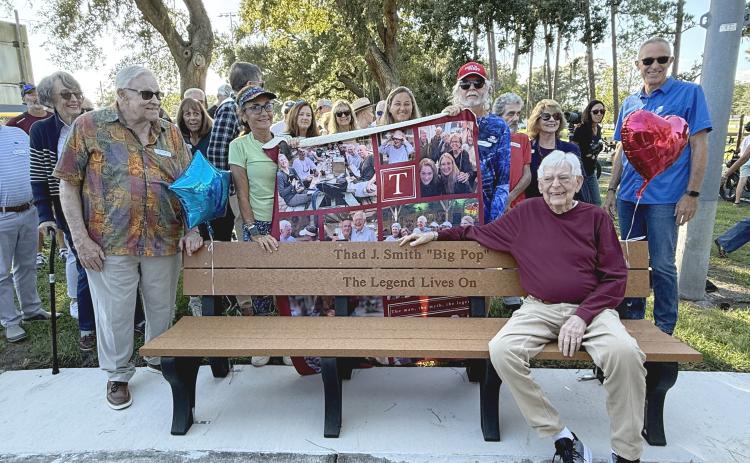 The pickleball community, friends and family honored Thad Smith, front, with a bench near Central Park’s pickleball courts last week. Photo by Nick Blank /News-Leader