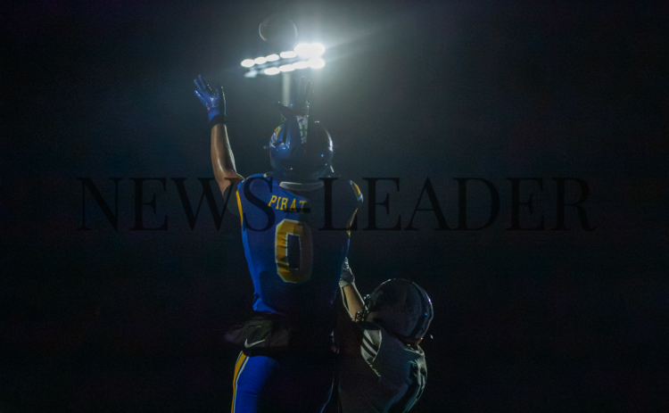 Ethan Watts makes a reception in the end-zone Friday. Photo by Suzi Hamilton/For the News-Leader
