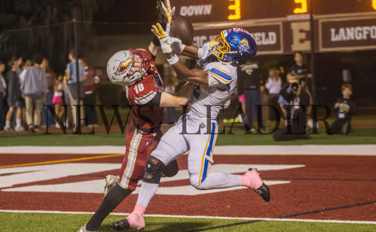 Aydin Poe attempts a Pirates reception near the endzone Friday. Photo by Nick Blank/News-Leader