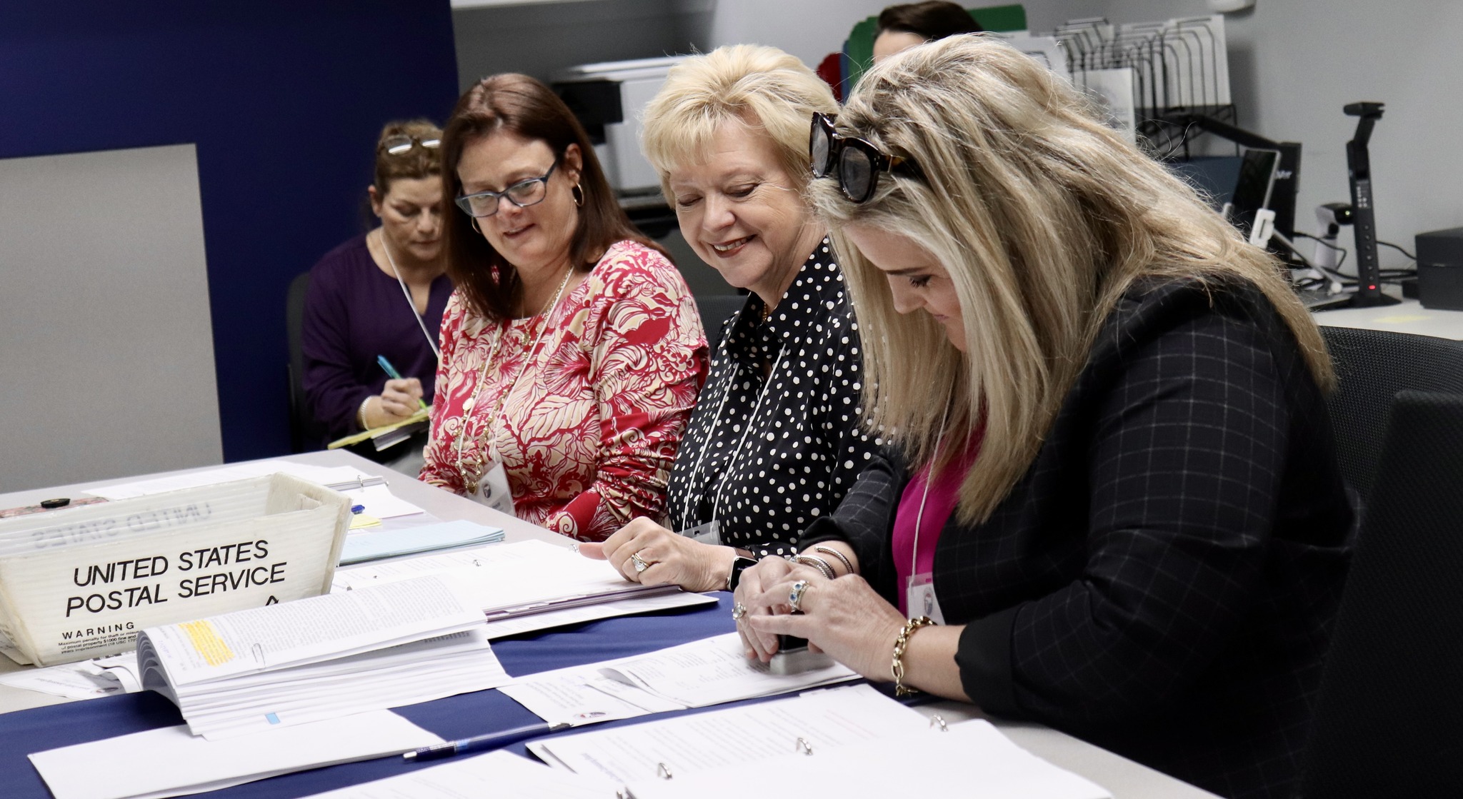 From left, Assistant Supervisor of Elections Maria Pearson, Alternate Canvassing Board member Teresa Prince, Supervisor of Elections Janet Adkins and Judge Jenny Higginbotham, elections staff, election workers and the Nassau County Canvassing Board complete the Logic and Accuracy Test on the voting and audit equipment in preparation for the March 19 Presidential Preference Primary Election. Submitted