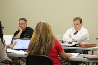 Nassau County School District Director of Facilities Jeffrey Bunch and attorney Damon Kitchens participate in Wednesday's bargaining session with the Nassau Educational Support Personnel Association. Holly Dorman/News-Leader