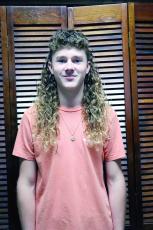 Hilliard teen Fisher Monds dons a mullet that won second place and $500 in the 2022 U.S.A. Mullet Championship. The 15-year-old competed in the teens division among 11 finalists, growing his hair to at least 23 inches. Photo by Kathie Sciullo/Nassau County Record.