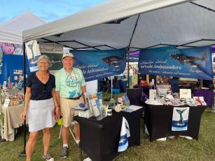 The Amelia Island Whale Ambassadors set up a booth in support of the North Atlantic right whales. Submitted photos.
