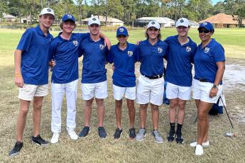 The Fernandina Beach High School boys golf team, which includes, from left, Tanner Millar, Decah McDaniel, Sean Benjamin, Brady Steffen, Noah Reynolds and Colby Albert with coach Christina Steffen, at the Region 1-2A tournament Tuesday. Submitted photo.