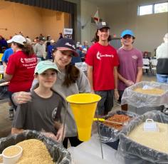 Over 230 volunteers gathered at the Atlantic Recreational Center on Saturday, Feb. 4, to pack over 40,000 meals of rice, soy, dried veggies, and nutrients on behalf of Rise Against Hunger.  Submitted photo