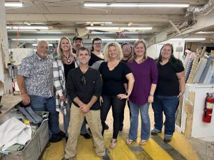 The Rowland’s Upholstery team, from left, Wallace Rowland, Autumn McDonald, Todd Rowland, Dexter Rowland, Madison Sutton, Arlene Wallace, Darlene Pearson, Mary Beth Douglas and Bonnie Hastings. Not pictured: Claudette Drury, Holly Blacker, Clayton Rowland and Mark Reid.  Photo by Sean Rosenthal