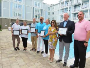 Representatives from the five newly-accredited hotels received their certificates on behalf of their businesses Saturday. Audubon International Chief Operating Officer Fred Realbuto presented the certifications.