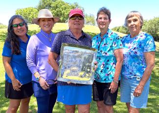 Pictured are, from left, Mia Fitzgerald, Janet Wood-ward, Ann Gutter, Sue Riegler and Sue Lansdell. Submitted photo