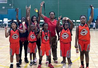 The Nassau Ballerz hosted the Last Ride Bash basketball tournament Friday through Sunday. Winners included Future Stars out of Waycross, Ga., third- and fourth-grade girls, above right. Submitted photo