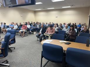 Commission chambers were full ahead of the Nov. 7 Planning and Zoning board meeting to discuss the rezoning of approximately 206 acres of land in the Nassauville area from Open Rural to Residential. Photo by Sean Rosenthal/News-Leader