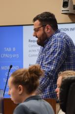 Josh McBeth presents on Tab B  April 2 at the Planning and Zoning Board meeting.  Photo by Ashley Chandler