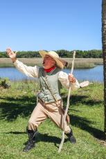 Mike Adams, also known as Billy Bartram, stands in front of Egans Creek River on Saturday after giving an Interpretive Talk about Bartram and his travels. Photo by Ashley Chandler
