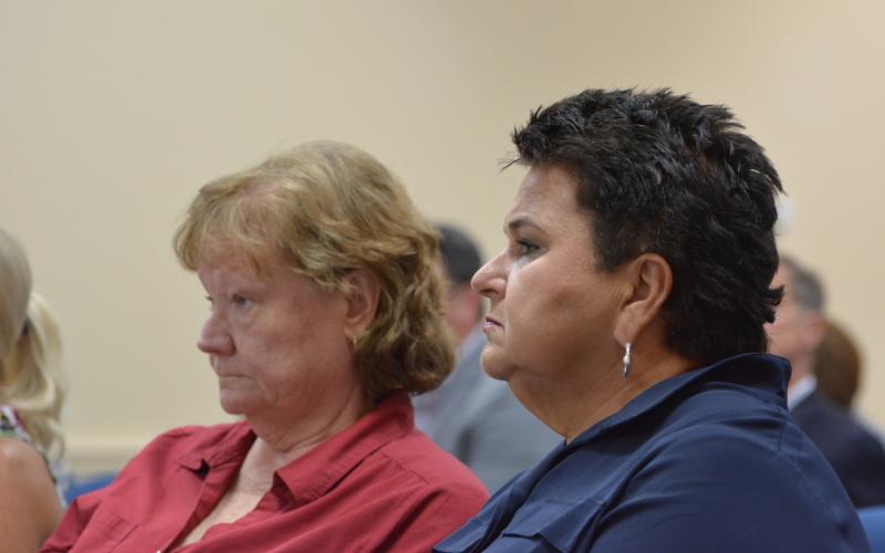 Nassau County School District board chairwoman Donna Martin and superintendent Kathy Burns attend a Nassau County Commissioners meeting in June, where the commissioners voted to add an additional mill to the ballot for voters to decide upon. Photo by Marissa Mahoney.