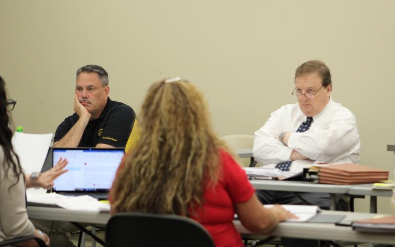 Nassau County School District Director of Facilities Jeffrey Bunch and attorney Damon Kitchens participate in Wednesday's bargaining session with the Nassau Educational Support Personnel Association. Holly Dorman/News-Leader