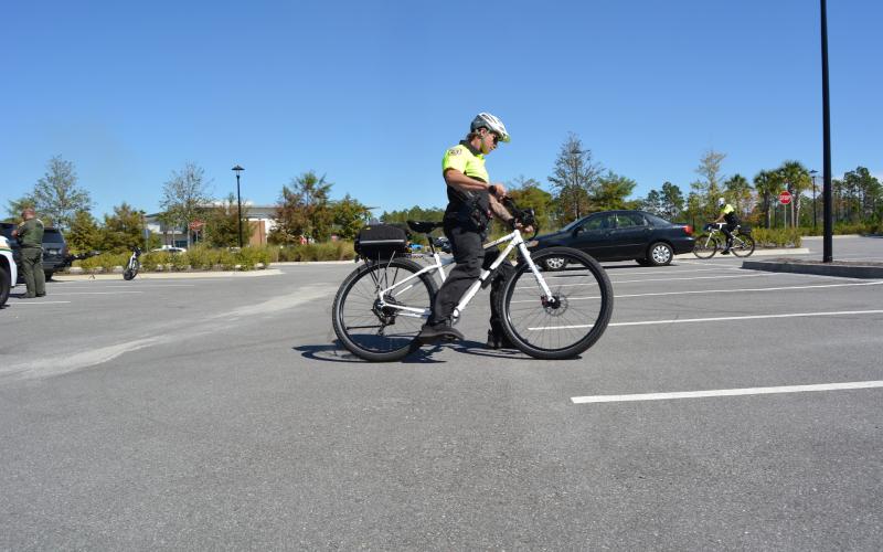 Three NCSO deputies gave a quick demonstration of their newfound bike riding skills during the unveiling. Photos by Marissa Mahoney/News-Leader.