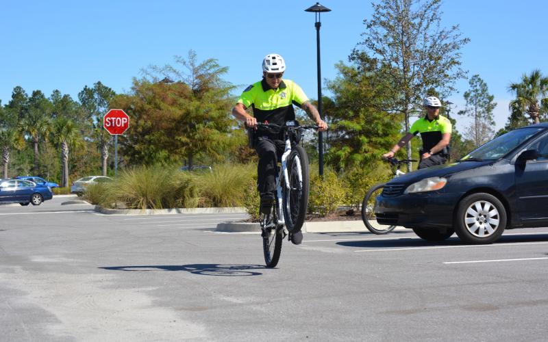 Three NCSO deputies gave a quick demonstration of their newfound bike riding skills during the unveiling. Photos by Marissa Mahoney/News-Leader.