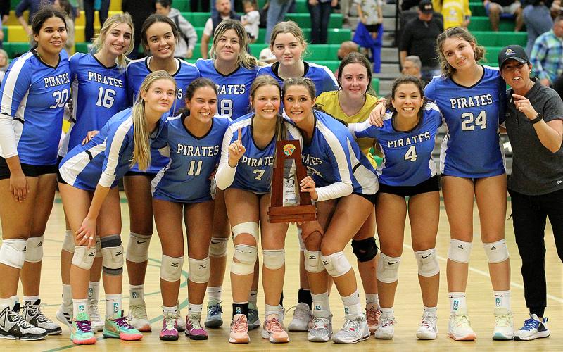 The Fernandina Beach High School volleyball team celebrate its second district title in a row Thursday night, beating host Yulee 3-0 in the championship game. The FBHS Lady Pirates advanced to the region playoffs and hosted Beachside High Tuesday in a region quarterfinal match. Photos by Beth Jones/News-Leader.