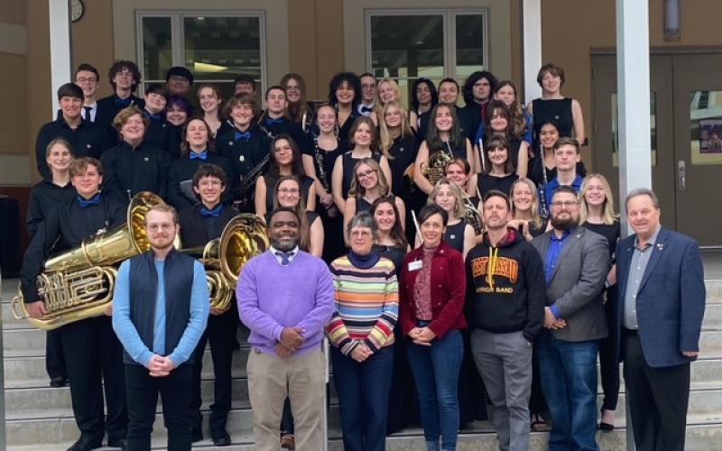 Nassau County band students and directors and Nassau County School Board members gather for a celebratory group photo at the recent All District Band Concert in Jacksonville. Submitted photo.