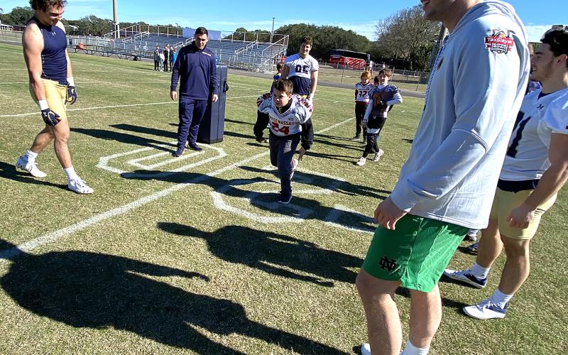 Growing the Game, a program through the TaxSlayer Gator Bowl, which allowed the youths to engage with Notre Dame football players.