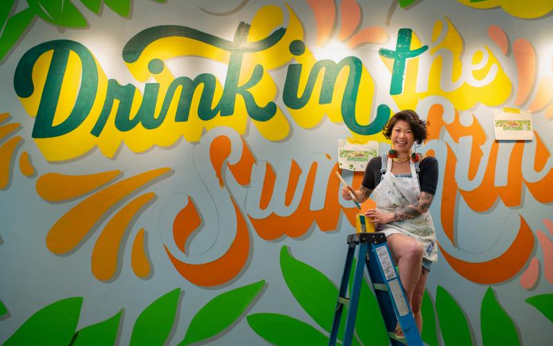 Local artist Lauren Hom partnered with Visit Florida and The Florida Department of Citrus to paint this mural welcoming visitors to Florida. Submitted photo