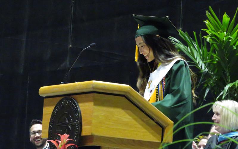 Yulee High School salutatorian Tristny Ta joked she had come in as the first-place loser at commencement before going on to thank her teachers, family and peers for their love and support.  Holly Dorman/News-Leader